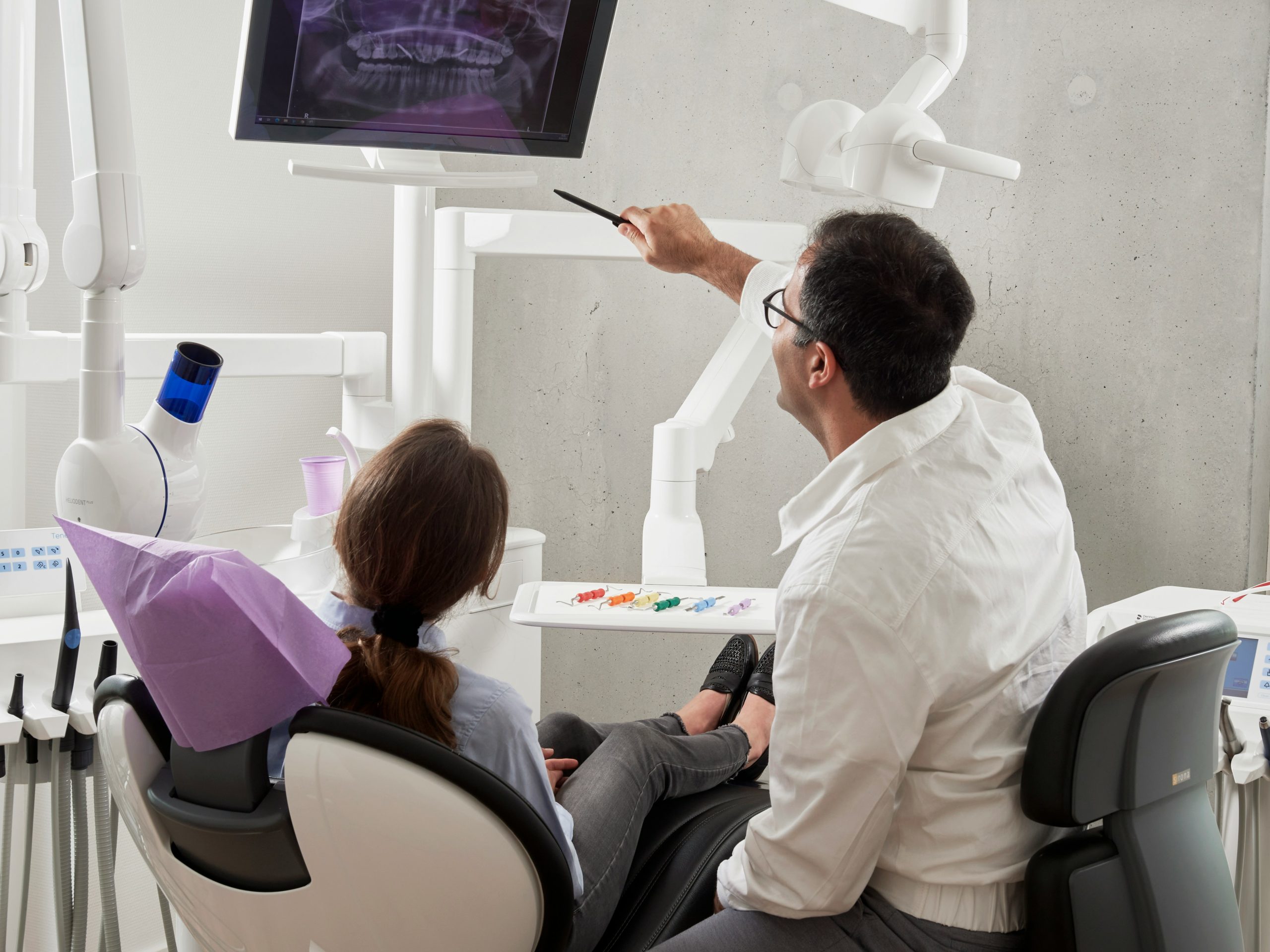 Reviewing exam findings with a patient at Hyattsville Dental Care